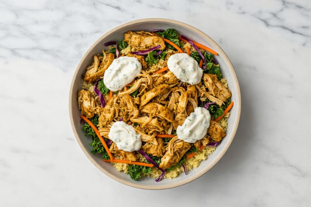 Chicken shawarma bowl with fresh vegetables and herbs